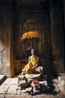 Offerings at shrine in Angkor Wat