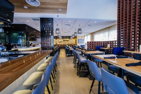 Tables and chairs in modern bar and restaurant