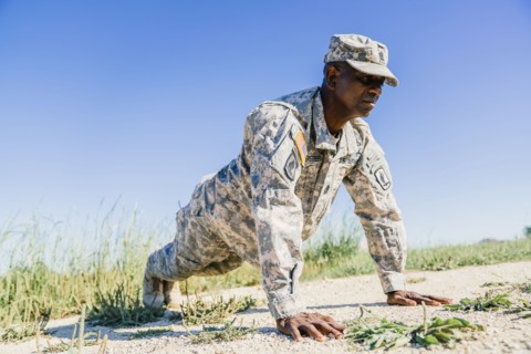 Black soldier doing push-ups