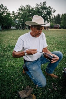 Caucasian farmer preparing vaccine in syringe