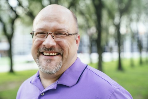 Portrait of laughing Caucasian man in park