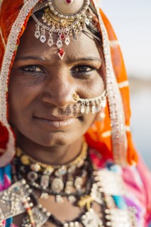 Close up of Indian woman wearing traditional jewelry