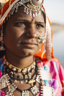 Close up of Indian woman wearing traditional jewelry