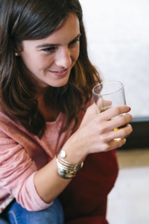 Caucasian woman drinking juice