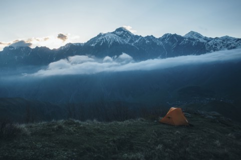 Camping tent in mountain landscape
