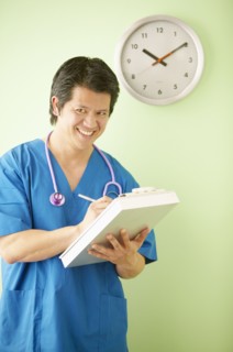 Portrait of male nurse with clipboard