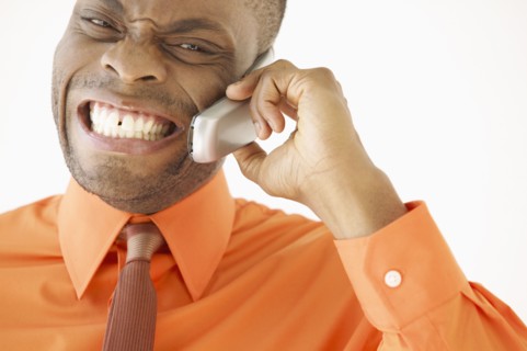 Portrait of businessman talking on cell phone