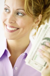 Woman holding cash