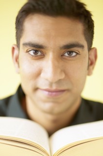 Portrait of man reading book