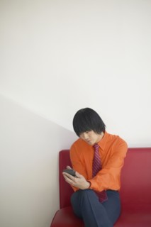 Businessman sitting on a couch