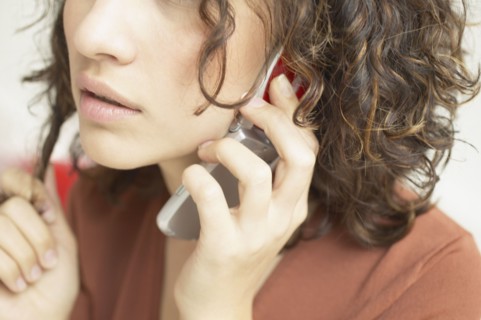Close up of woman talking on mobile phone