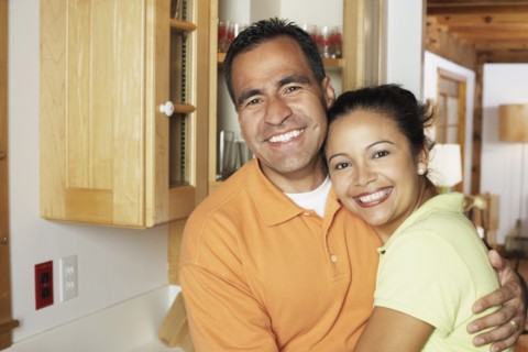 Couple hugging for the camera