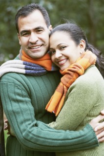 Couple hugging outdoors