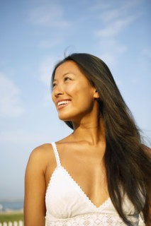 Asian woman looking to side