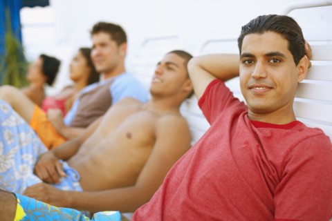 Young man in lounge chair