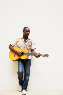 African man playing guitar