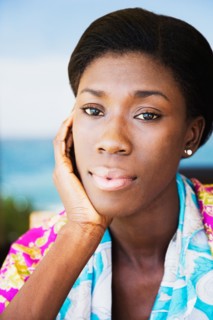 African woman with head in hands
