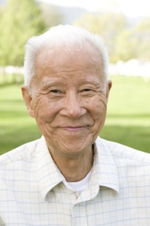 Smiling senior Chinese man
