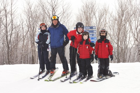Caucasian family on ski slope