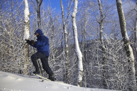 Caucasian man snowshoeing