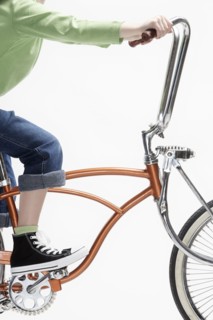 Caucasian girl riding bicycle