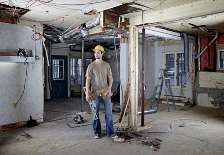 Caucasian construction worker in hard hat on site