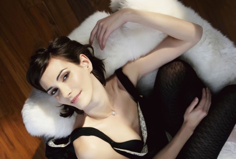 Caucasian woman laying on shag rug