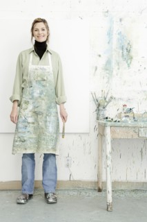 Caucasian painter smiling in studio