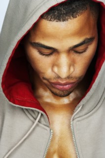 Mixed race man wearing hoody