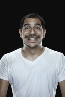 Portrait of excited man smiling