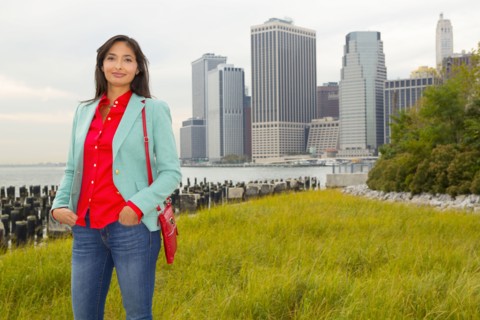 Mixed race woman smiling in park