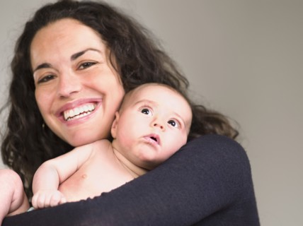 Mother holding newborn baby