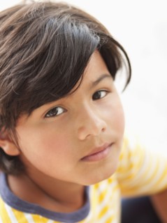 Serious Hispanic boy
