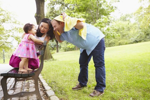 Family playing together in park