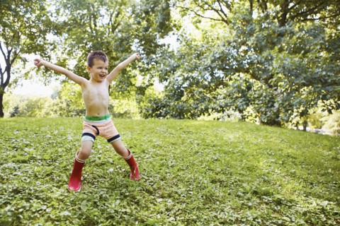 Caucasian boy playing in park
