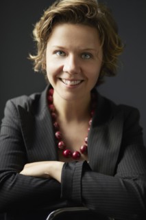 Smiling businesswoman posing in studio