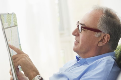 Hispanic man reading map