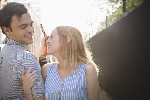Caucasian couple standing in city