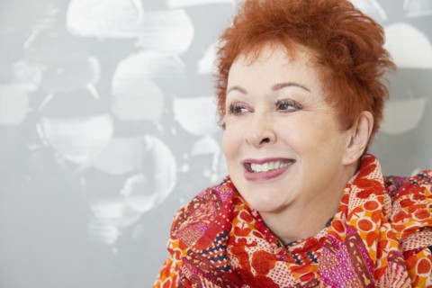Older Caucasian woman wearing colorful scarf