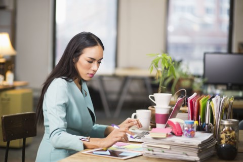 Thai transgender businesswoman working in office