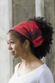 Mixed race woman in traditional headscarf