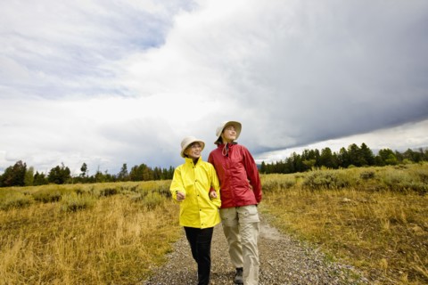 Japanese mother and daughter hiking in remote area