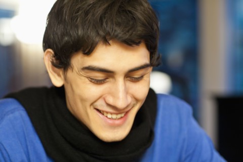 Mixed race man smiling