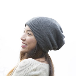 Japanese woman wearing beanie outdoors