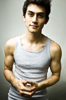 Portrait of Mixed Race man wearing tank-top