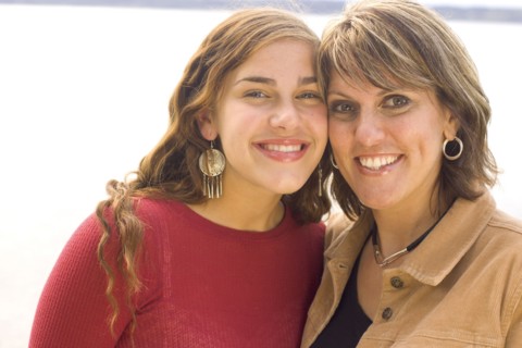 Portrait of smiling mother and daughter
