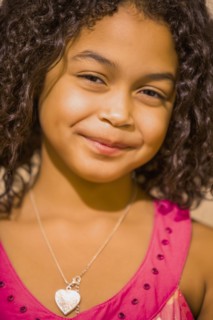 Close up of smiling Hispanic girl