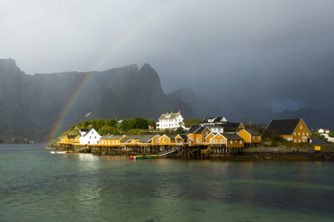 Rainbow over buildings in Sacrisoy