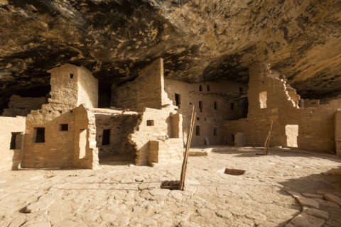 Cliff dwelling ruins in rock face
