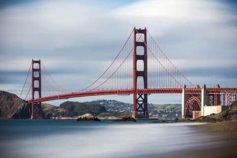 Time lapse view of ocean under Golden Gate Bridge